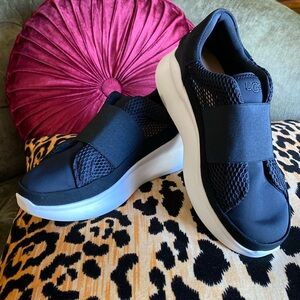 UGG black perforated pull-on sneakers, size 6.